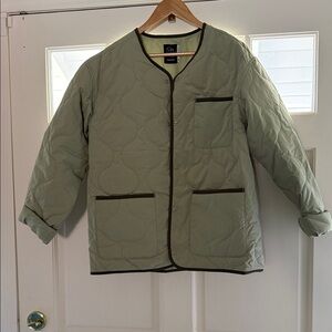 Quilted Green Jacket with Black Trim